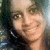 A person with long dark hair and light skin appears in three showing subtle facial expression changes