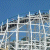Pixelated static image showing a grid of white lines over blue and gray tones with scattered dark patches.