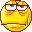 Pixelated yellow circular face with brown outline, blue eyes, and multiple expressions including squinting, narrowed eyes, and closed eyes across three