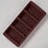 A chocolate bar in a white wrapper on a light background with text reading 'Gimme Your Chocolate!!' in pixelated font on a brown background.