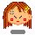 Pixel art of a character with brown hair and yellow flower clips, showing two expressions: neutral face with gray cross on forehead and pink blushy face.