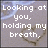 A four- displays pixelated text over a light gray background with a faint heart outline, each containing distinct phrases