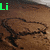 A static image of a brown textured surface with dark irregular patterns, overlaid by text in various colors and partial names.