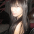 A person with long dark hair and light skin appears in three showing slight head movement and facial expression changes