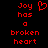 Red pixelated text on black background reads 'Joy has a broken heart' with a red broken heart symbol above the word 'has'.