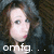 A pixelated image of a person with brown hair and red lips, featuring overlaid text reading 'omfg... it's Alyesha' in white font.