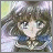 Pixelated anime-style character with brown hair and blue eyes, wearing a blue and white outfit, positioned next to black background with white text.