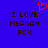 Blue background with dark brown pixelated text reading "I LOVE MEAGAN FOX" and a red pixelated heart symbol above the text.