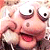Pixelated static image of a cartoon character with exaggerated facial features and pinkish skin tones, likely from an AOL Instant Messenger buddy icon collection.