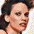 A 4-frame contact sheet of a pixelated animated icon featuring three distinct facial expressions and a website URL on a brown background.