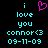 Pixelated cyan text on black background with a pink heart symbol replacing the 'i' in 'i love you', two identical copies side-by-side.