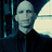 Pixelated image of a pale-skinned figure with dark clothing against a blue background, with text reading "Republicans" and "Vote For Voldemort."