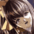 Pixelated image of two figures in close physical contact with dark hair and light skin tones, set against a warm-toned background with yellow and brown hues.
