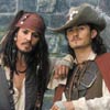 Two figures in pirate-style clothing stand side-by-side against a blurred background, one with a red bandana and long dark hair, the other with a wide-brimmed hat and a red shoulder piece.