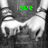 Black-and-white image of two hands clasped in front, with green pixelated text 'love me' above and 'forever' below.