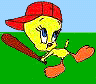 Yellow cartoon bird with red cap and orange feet holds brown bat, standing on green field under light blue sky.