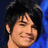 Four identical pixelated headshots of a smiling man with dark hair against a blue background, each with distinct text overlays in white block letters on black bars.