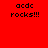 Red background with black text 'acdc rocks!!!' repeated across multiple white rectangular sections in a