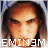 Pixelated static image of a person's face with text "EMINEM" at the bottom, displayed on a gray background.