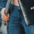 A 3x3 contact sheet of animated frames from a Final Destination 3 movie-themed buddy icon showing a woman in blue clothing with long dark hair holding an object, transitioning to her face and upper body against a light background.
