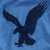 Animated sequence showing an eagle silhouette on blue, transitioning to white script 'AE' on black, then a sunburst logo with 'AMERICAN EAGLE' text on orange.