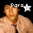 A person in a light brown jacket and dark tie appears across four with text overlays reading 'Pars', 'loves', 'NICK!!!' each next to a white star symbol