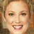 A pixelated image shows a smiling woman with light brown hair on the left, next to a golden 'The Suite Life' logo and a Disney watermark.