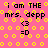 Pixelated pink background with yellow circular patterns and black text reading 'i am THE mrs. depp <3 =D' in four identical sections.