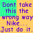 Pixelated text repeats across cyan and yellow background sections with purple lettering.