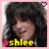 A 3x3 contact sheet of six animated frames showing a woman with dark curly hair and pink heart icons, plus one static frame with text reading "GIGIS FAVE SINGER" on black background.