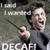 Pixelated image of a person holding a microphone with text above and below the figure.