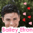four identical images showing a person with dark hair against green foliage, surrounded by floating red and pink heart shapes