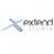 Pixelated grayscale icon with a cross-like shape on the left and a blocky text-like form on the right against a white background.
