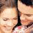 Static 48x48 pixel icon showing two close-up faces in a side-by-side composition with visible pixelation and dithering effects.