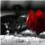 A static pixelated image shows a dark figure with red accents on the right side against a gray background.