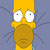 Pixelated yellow cartoon character with wide eyes and open mouth against gray background.