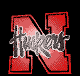 Animated sequence of red blocky 'N' letters with black-and-white 'Hukert' text overlay, transitioning through various pixelated states against a black background.