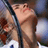Static 48x48 pixel icon showing a tennis player in mid-action with blurred background elements, rendered at 256x256 resolution.
