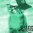 Pixelated green-toned static image of a figure in dark clothing holding an object against a light background.