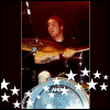 nine animated frames showing a band performing on stage with white stars scattered across the bottom-left and right edges