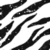 Black and white zebra-stripe pattern with diagonal stripes on a white background, partially cropped with a gray rectangle in the bottom-right corner.