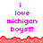 Pixelated text reads 'i love michigan boys!!!' in pink on white background with red jagged border, displayed in two with partial gray overlay