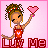Pixel art of a doll with brown braided hair holding a pink heart, standing against a pink background with 'Luv Me' text below.