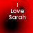 Red background with white text reading "I Love Sarah" and four black circular blurs in different positions across the