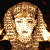 Pixelated image of a figure with light brown hair styled in an ancient Egyptian headdress, showing three sequential poses against dark background.