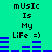 Pixelated green background with blue audio equalizer bars and black text reading "mUSiC Is My LiFe =)" in two identical vertical sections.