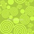 A static pixelated image featuring multiple overlapping circular and spiral patterns in varying shades of green.