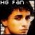 Pixelated image of a person's face with orange-brown hair, dark eyes, and neutral expression under white text reading 'HG Fan' on black background.
