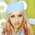 A split-frame contact sheet showing a pixelated image of a person with light hair and blue headwear on the left, next to green text reading "Original Icons .com" on a dark background.