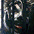 Four distinct pixelated faces arranged in a , each with unique expressions and color palettes